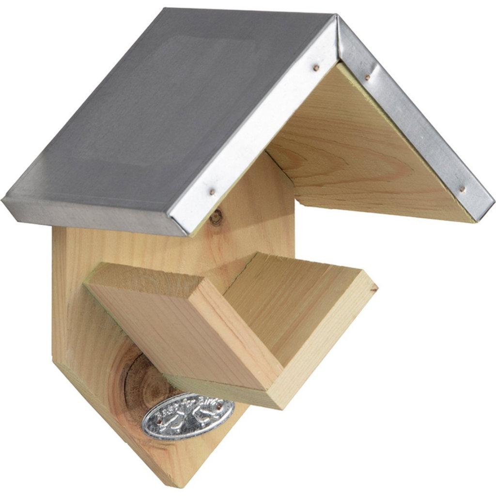 Drevený domček z arašidového masla pre vtáky